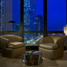 Gold Armchairs and Skyline at Night