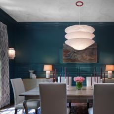 Blue Dining Room With Sculptural Pendant