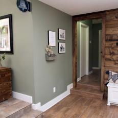 Seafoam Green and Natural Wood Foyer With Stone Tile Raised Landing 