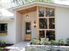 Natural Cedar Window Framing and Matching Front Door With White Painted Brick Home Exterior 