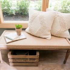 Neutral Window Seat With Textured Cream Fabric Pillows 