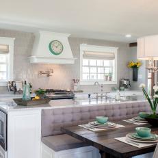 Gray and White Open Plan Cottage Kitchen With Banquette