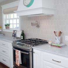 Gray and White Cottage Kitchen With Clock