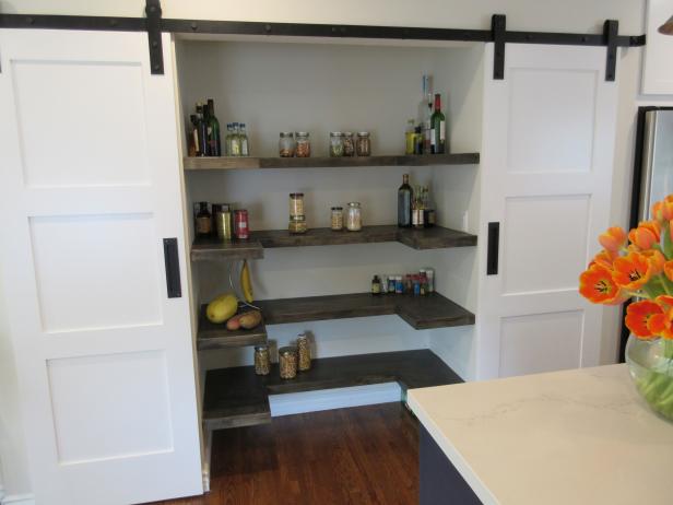 White Barn Door Pantry With Natural Wood Horseshoe Floating