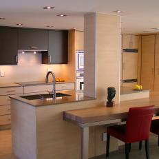 Neutral Modern Open Plan Kitchen With Red Chairs