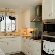 White Kitchen With Green Tile Backsplash