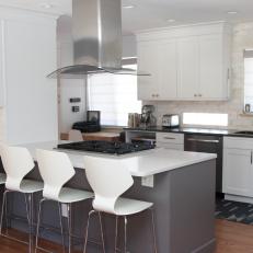 Gray and White Open Plan Kitchen With Graphic Rug