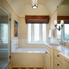 White Master Bathroom With Graphic Rug