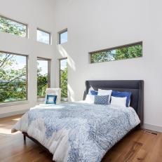 Contemporary Bedroom With Blue Bed