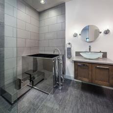 Gray Modern Bathroom With Metal Tub