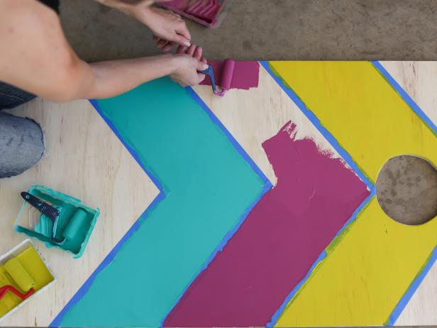 Now the fun part, paint a bright color in each taped off section. Remove tape once completely dry.