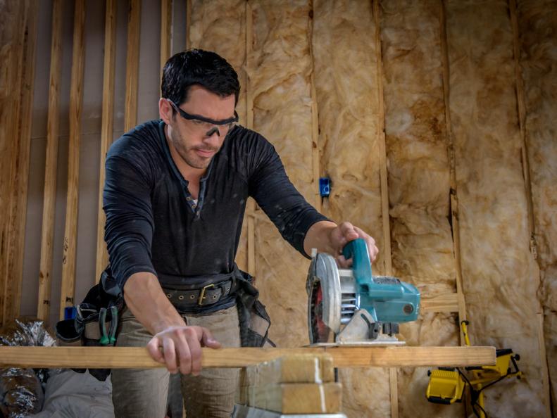 Jonathan and Drew Scott work side-by-side to renovate a traditional shotgun style house in the heart of New Orleans. They compete to increase the value of their home and restore the historical gem to its former glory. Drew working on his side of the home, as seen on Brothers Take New Orleans.