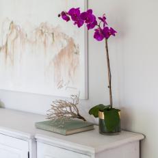 Purple Orchid on White Cabinet