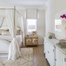 White Cottage Bedroom With Orchid