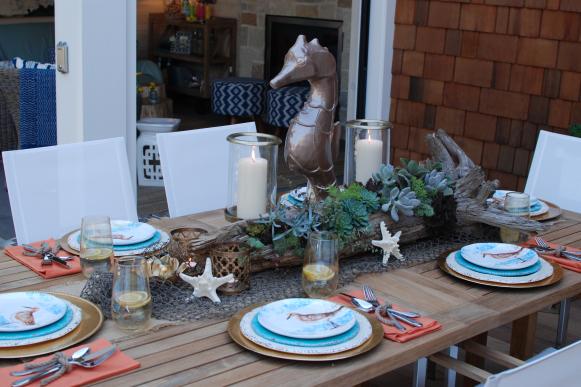 Outdoor dining table with coastal accents