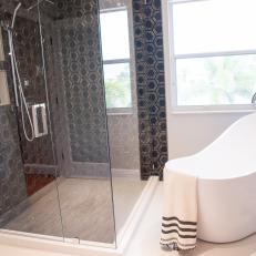 Small Spa Bathroom With Black Shower Backsplash