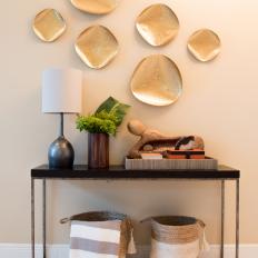 Console Table With Baskets and Art