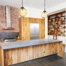 Contemporary Open Kitchen With Brick Wall