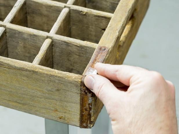 Create a side table from an old soda crate