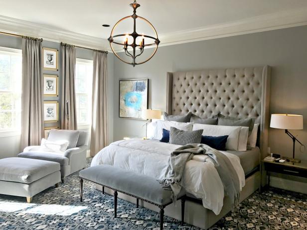 Large Beige Tufted Headboard Over Layered Pillows In Traditional 