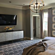 Metallic Cabinet Door Bedroom Buffet Over Patterned Blue and Gray Carpet 