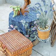 Vintage Baskets and Floral Fabric Decorate French-Inspired Patio