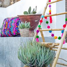Colorful Pom Pom Garland Decorates Mexican-Inspired Patio