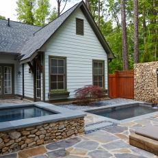 Hot Tub and Water Feature Make Small Backyard an Outdoor Oasis