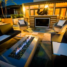 Rooftop Terrace Seating Area With Fire Pit and Flat-Screen TV