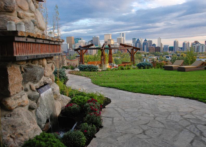 Outdoor Seating Area, Water Feature and City Skyline