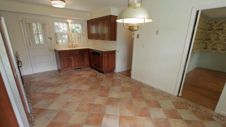 Kitchen - Before 2: As seen on HGTV’s Property Brothers, the small and dark kitchen in Bridget and Tom’s home in Stamford, New York, before.