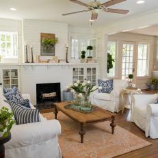 Contemporary Living Room With White Brick Fireplace