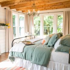 Renovated Bedroom With Exposed Wood Beams