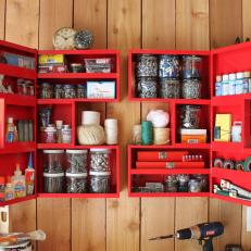 Red Cabinet Stores Hardware in Organized Garage
