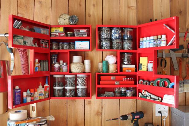 Red Cabinet Stores Hardware in Organized Garage