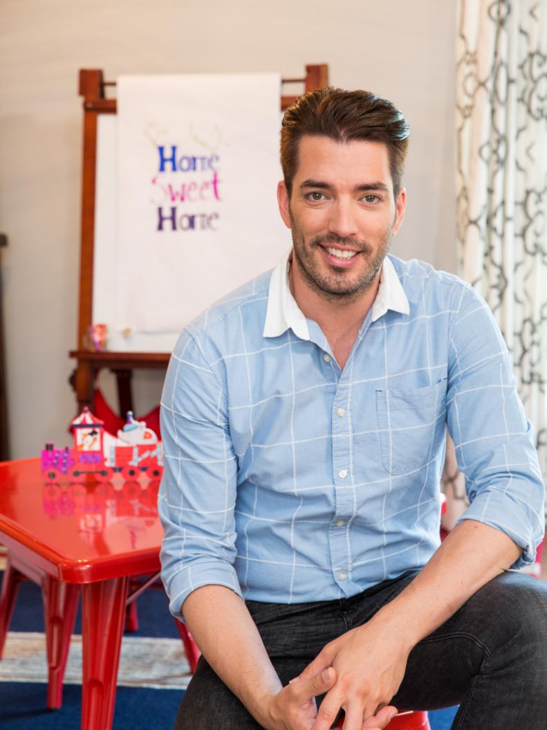 Host Jonathan Scott poses for a portrait in the boys' play area in the living room of Tom and Michelle Murphy's newly-renovated home in Chappaqua, New York, as seen on Property Brothers. (Portrait)