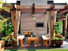 Asian-Inspired Outdoor Area With Fireplace and Pergola