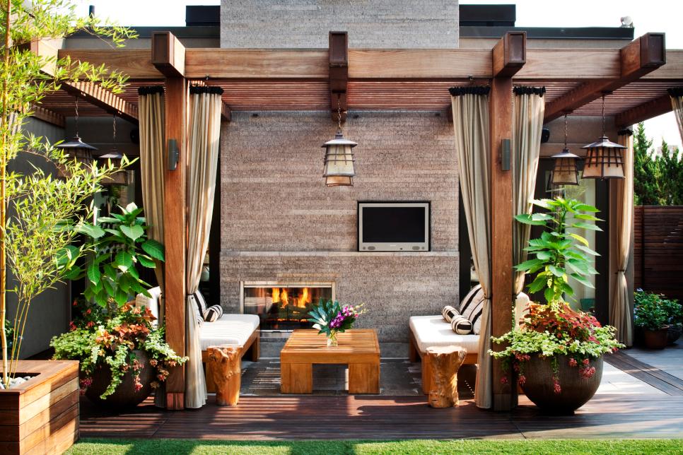 Asian-Inspired Outdoor Area With Fireplace and Pergola
