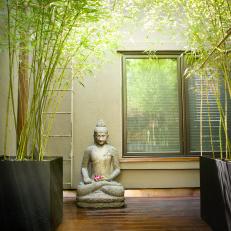 Asian Outdoor Space With Buddha Statue