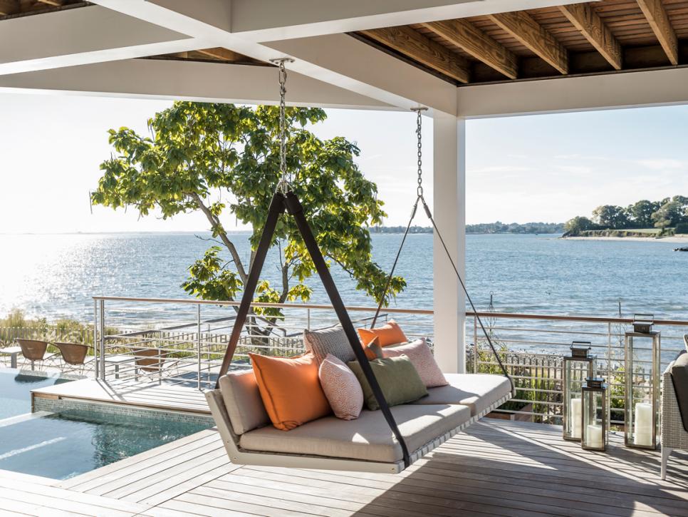 Porch Swing on Covered Deck With Water View