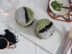 These green tea matcha cakes, filled with sweet yet woody black sesame cream, are almost to pretty to eat.