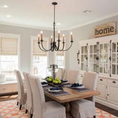 Open Dining Room with Bay Window and Chandelier
