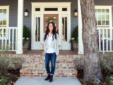 Host Joanna Gaines in front of the newly renovated Downs home, as seen on Fixer Upper. (portrait)