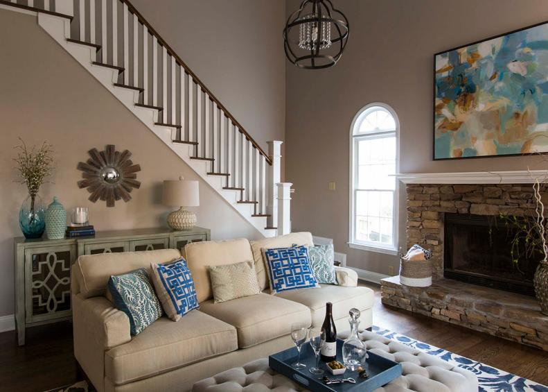 Beige living room with pops of blue.