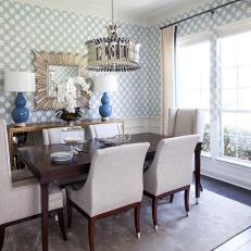 Blue and White Transitional Dining Room With Blue Lamps
