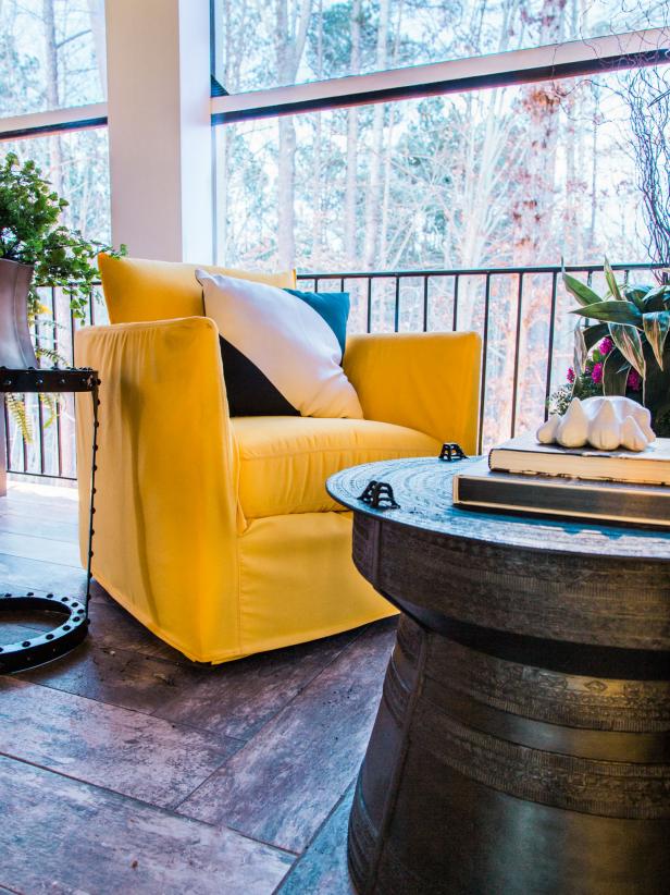 HGTV Smart Home 2016 Yellow-Slipcovered Armchair on Screened Porch