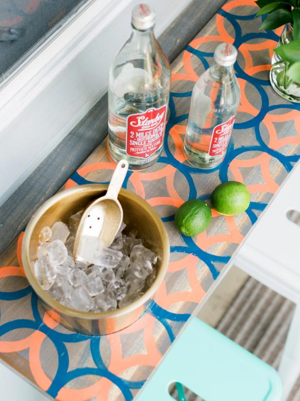 This versatile DIY drop down bar is perfect for small spaces, with a fun colorful pattern thatâ  ll punch up your dÃ©cor and just enough work surface to mix a cocktail or serve up brunch!