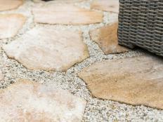 If your backyard is more eyesore than lush landscape, adding a DIY paver patio could be just the ticket to transform a patch of weeds into a relaxing outdoor room.