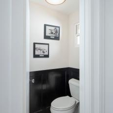 Black and White Powder Room With Photographs