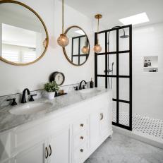 White Bathroom Vanity and Gold Pendants